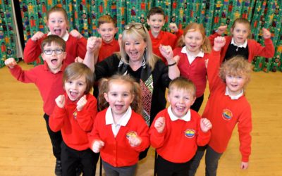 Mrs Angela Clark with pupils of Filey Church of England Nursery and Infants Academy, celebrating their ‘Good’ rating from school inspectors Ofsted.